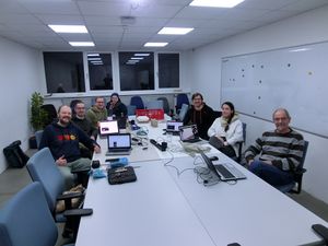 HWC Nuremberg 2023-12-13 Group Shot showing all 7 participants sitting around a conference table.